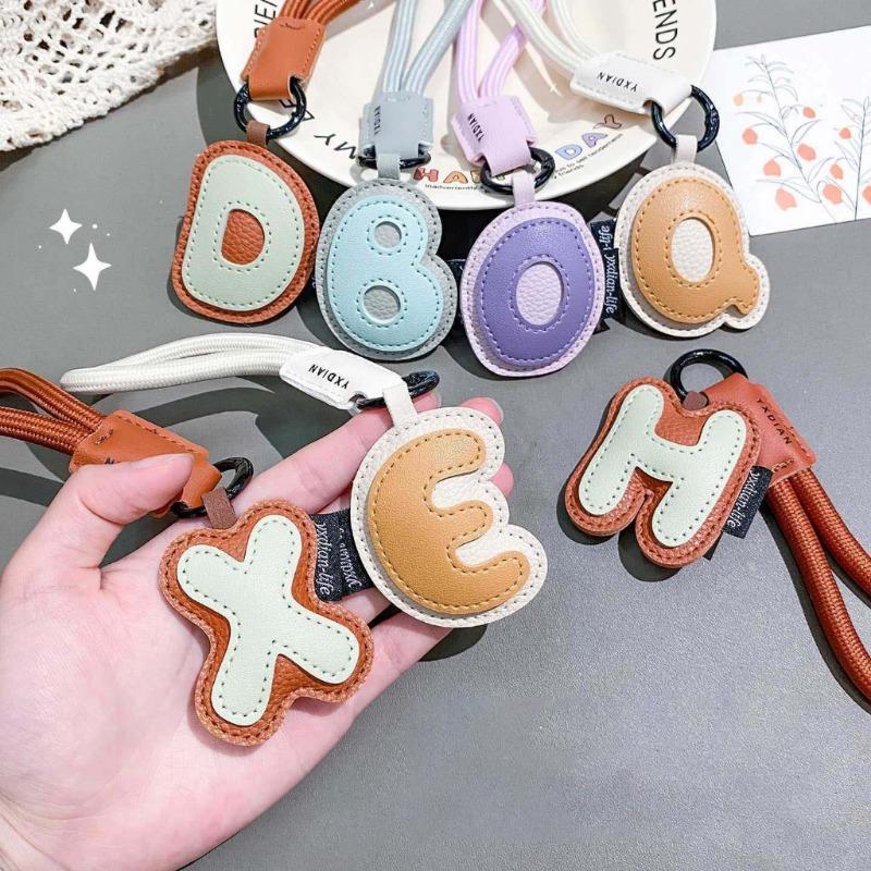 سلسلة مفاتيح من الجلد الصناعي  - مراجعة Monogram Keychain Leather وسعره