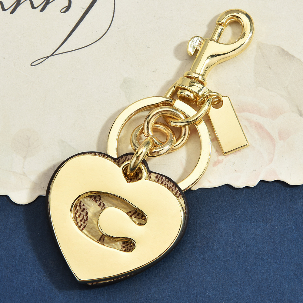 سلسلة مفاتيح بتعليقة حقيبة بتص - مراجعة Monogram Keychain Leather وسعره